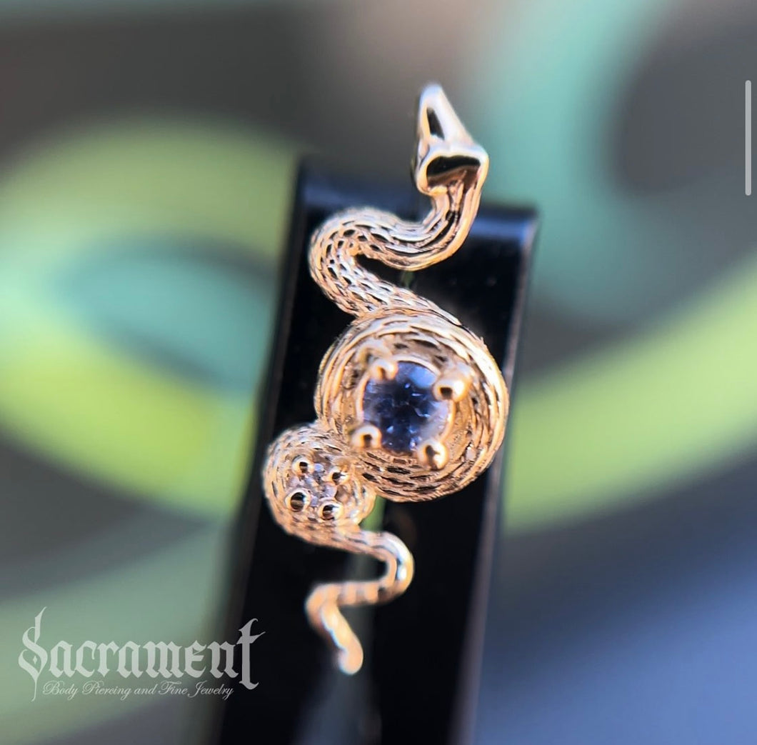 14 k Yellow Gold Snake featuring a genuine tanzanite center