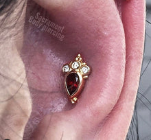 Load image into Gallery viewer, BVLA - Pear Sarai featuring Garnet pear(AA) with white diamonds ( VS) accents in solid yellow gold.
