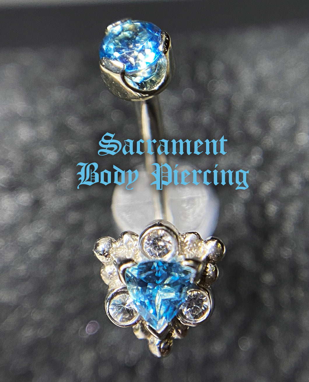 BVLA - Helena  j curve barbell featuring trillion cut blue swiss topaz w/ white sapphire accents